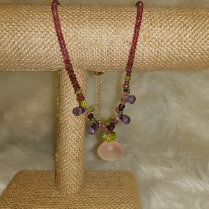 Beaded necklace with pink quartz stone